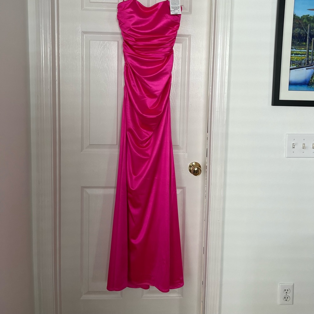 La Femme strapless chic liquid jersey dress with ruching throughout.